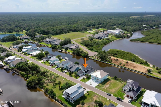 129 Seaside Pt, Flagler Beach, FL 32136 - aerial perspective of suburban area featuring a large body of water