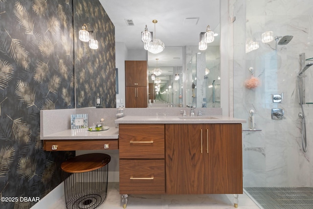 129 Seaside Pt, Flagler Beach, FL 32136 - full bathroom featuring a marble finish shower, vanity, wallpapered walls, and a chandelier