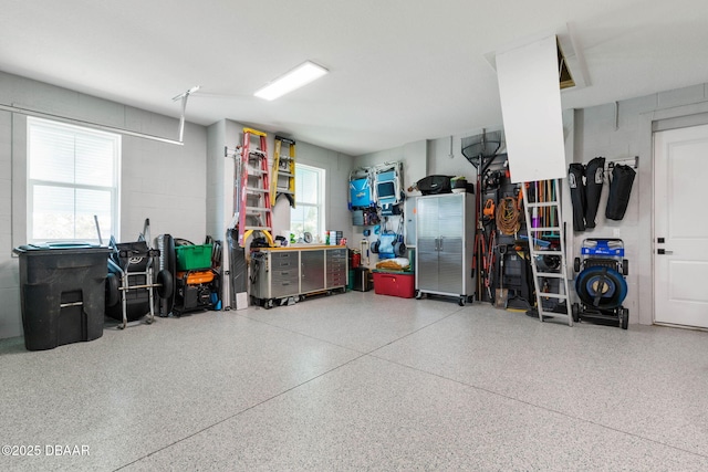 129 Seaside Pt, Flagler Beach, FL 32136 - garage featuring concrete block wall