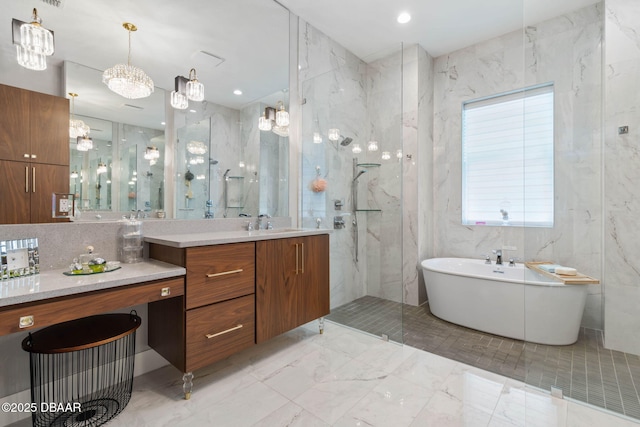 129 Seaside Pt, Flagler Beach, FL 32136 - full bathroom with a freestanding bath, vanity, a marble finish shower, marble finish flooring, and tile walls