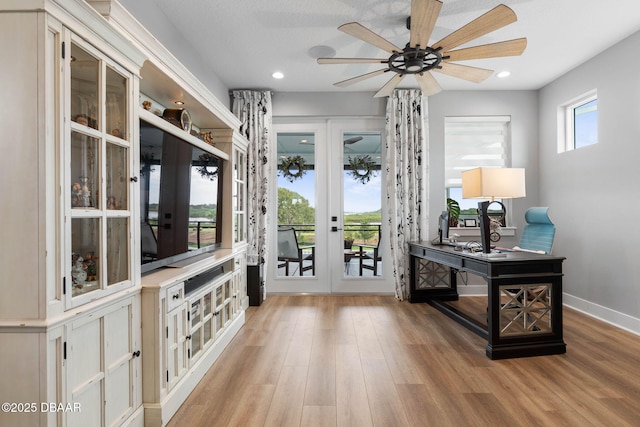 129 Seaside Pt, Flagler Beach, FL 32136 - entryway with french doors, wood finished floors, ceiling fan, and recessed lighting