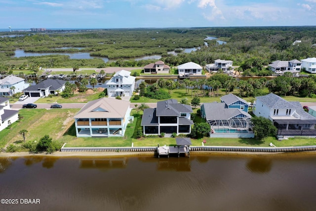 129 Seaside Pt, Flagler Beach, FL 32136 - aerial perspective of suburban area featuring a nearby body of water