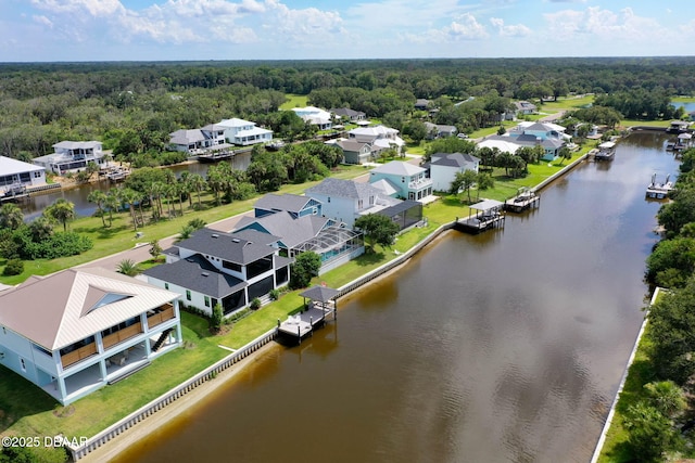 129 Seaside Pt, Flagler Beach, FL 32136 - aerial view of residential area featuring a nearby body of water