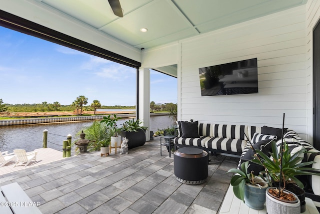129 Seaside Pt, Flagler Beach, FL 32136 - view of patio with a water view and a ceiling fan