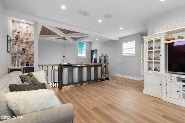 129 Seaside Pt, Flagler Beach, FL 32136 - living area with beam ceiling, light wood-style floors, and recessed lighting