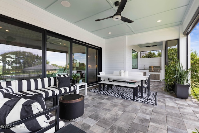 129 Seaside Pt, Flagler Beach, FL 32136 - view of patio with area for grilling, ceiling fan, outdoor lounge area, and outdoor dining space