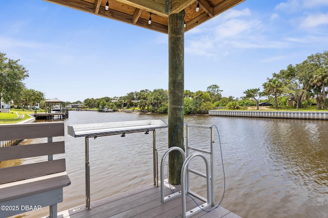 129 Seaside Pt, Flagler Beach, FL 32136 - dock area featuring a water view
