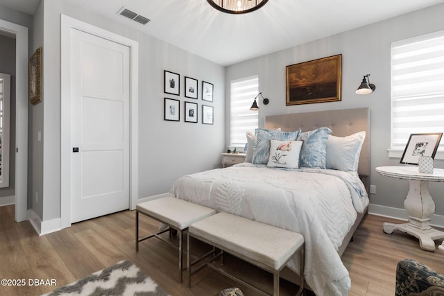 129 Seaside Pt, Flagler Beach, FL 32136 - bedroom with wood finished floors