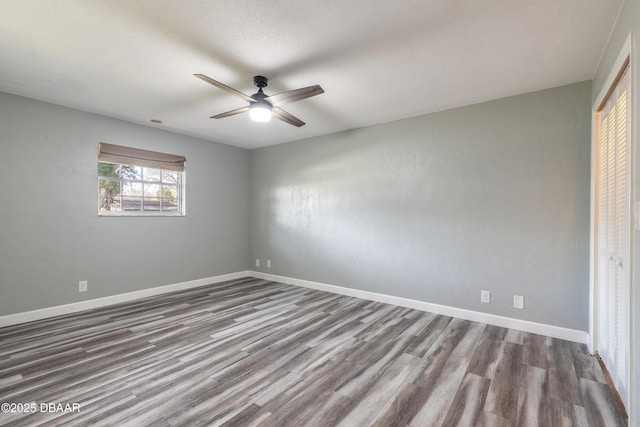 unfurnished bedroom featuring ceiling fan and wood-type flooring