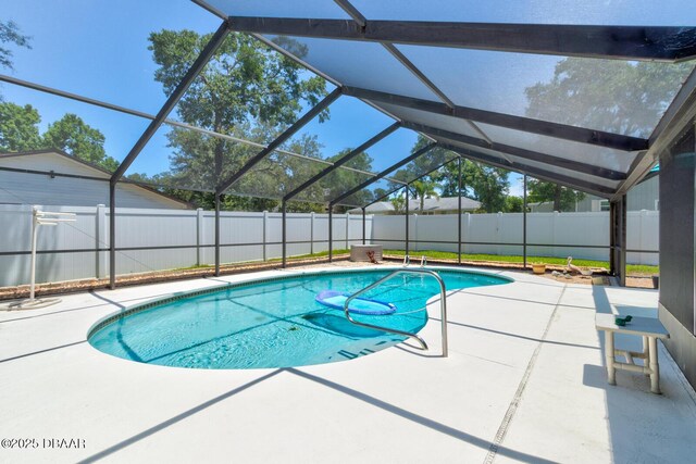 948 Northbrook Dr, Ormond Beach, FL 32174 - view of swimming pool featuring a patio area, a fenced backyard, and glass enclosure