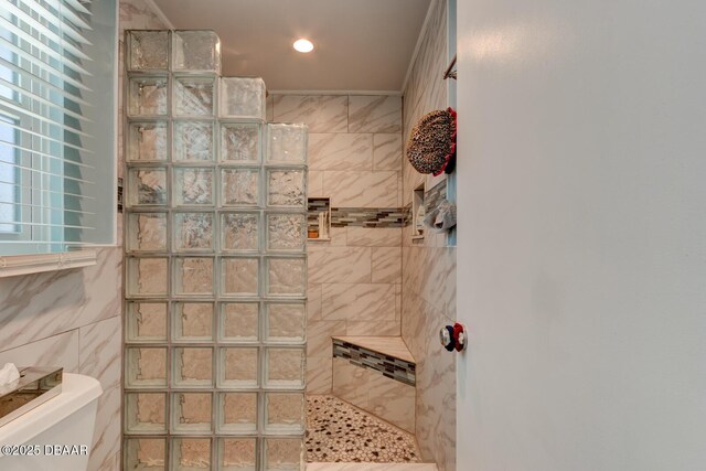 948 Northbrook Dr, Ormond Beach, FL 32174 - bathroom with a walk in shower, tile walls, and recessed lighting