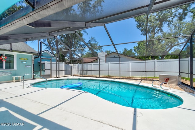 948 Northbrook Dr, Ormond Beach, FL 32174 - view of swimming pool with a patio, a fenced backyard, and glass enclosure