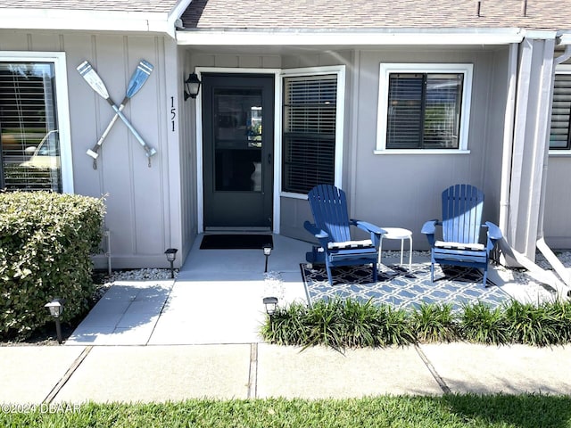 property entrance featuring a patio