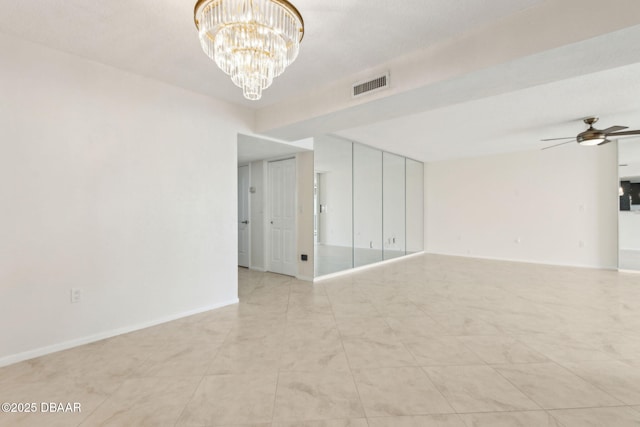 3003 S Atlantic Ave Unit 16B3, Daytona Beach Shores, FL 32118 - unfurnished room with a ceiling fan and a chandelier