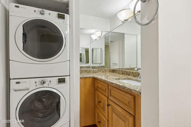 3003 S Atlantic Ave Unit 16B3, Daytona Beach Shores, FL 32118 - laundry room featuring stacked washer / drying machine