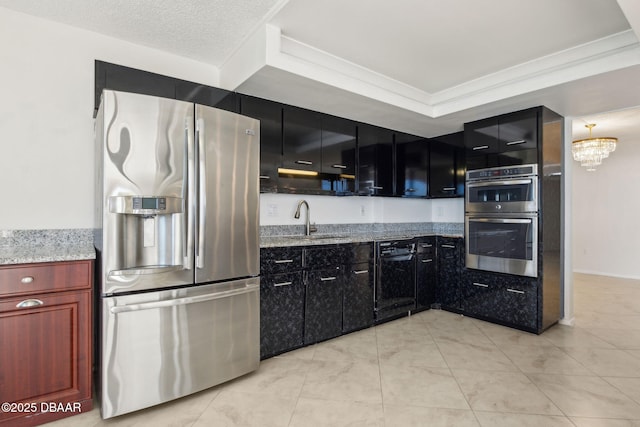 3003 S Atlantic Ave Unit 16B3, Daytona Beach Shores, FL 32118 - kitchen featuring stainless steel appliances, a sink, dark cabinetry, light stone countertops, and crown molding