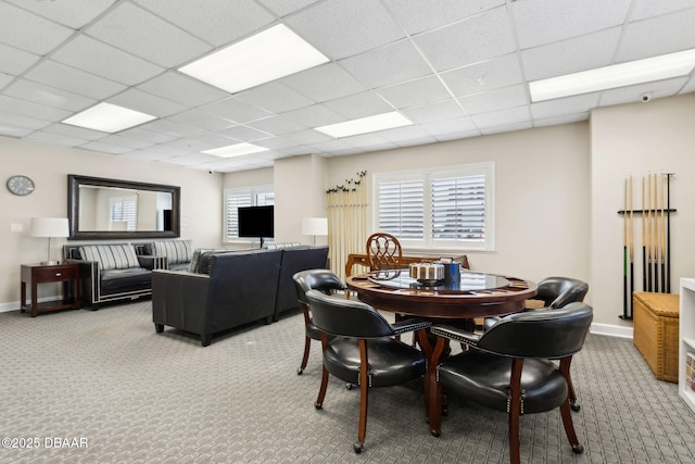 3003 S Atlantic Ave Unit 16B3, Daytona Beach Shores, FL 32118 - carpeted dining space with a paneled ceiling and baseboards