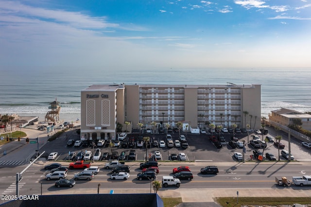 bird's eye view featuring a beach view and a water view