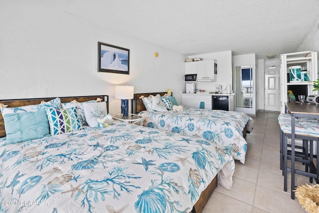 3501 S Atlantic Ave Unit 5200, Daytona Beach, FL 32118 - bedroom with light tile patterned floors and a textured ceiling