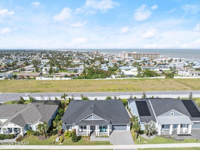 drone / aerial view with a water view