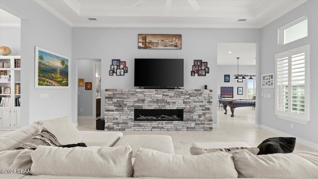 living room with light tile patterned flooring, ornamental molding, a fireplace, a notable chandelier, and billiards