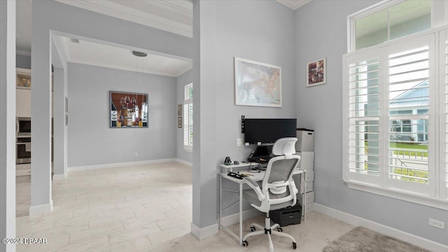 home office with a healthy amount of sunlight and ornamental molding