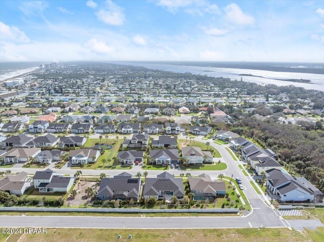 bird's eye view with a water view