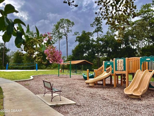 view of play area featuring a lawn