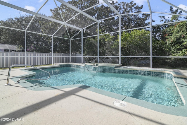 5976 Sawgrass Point Dr, Port Orange, FL 32128 - view of pool featuring a patio, a pool with connected hot tub, and a lanai
