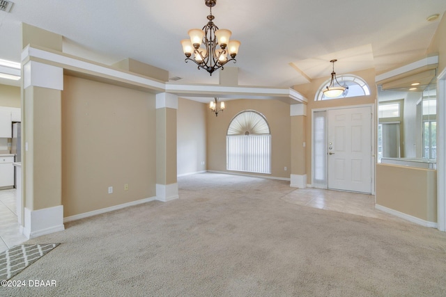 entryway featuring a notable chandelier and light carpet