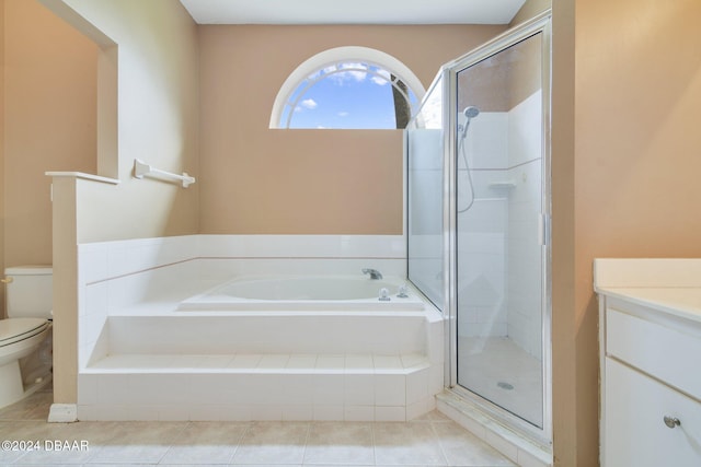 5976 Sawgrass Point Dr, Port Orange, FL 32128 - bathroom featuring a garden tub, a shower stall, tile patterned flooring, and vanity