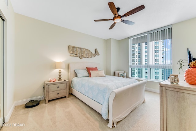 231 Riverside Dr Unit 1806, Holly Hill, FL 32117 - bedroom featuring light colored carpet and ceiling fan