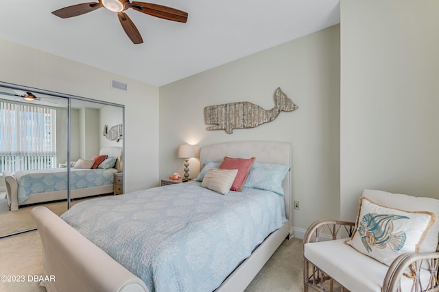 231 Riverside Dr Unit 1806, Holly Hill, FL 32117 - carpeted bedroom featuring a ceiling fan and a closet