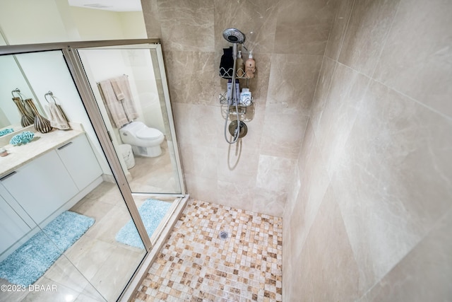 231 Riverside Dr Unit 1806, Holly Hill, FL 32117 - full bathroom with a stall shower, vanity, and tile patterned flooring