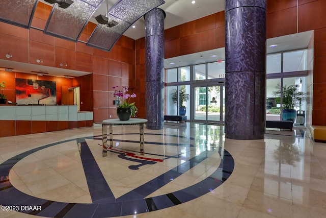 231 Riverside Dr Unit 1806, Holly Hill, FL 32117 - common area with a high ceiling and recessed lighting