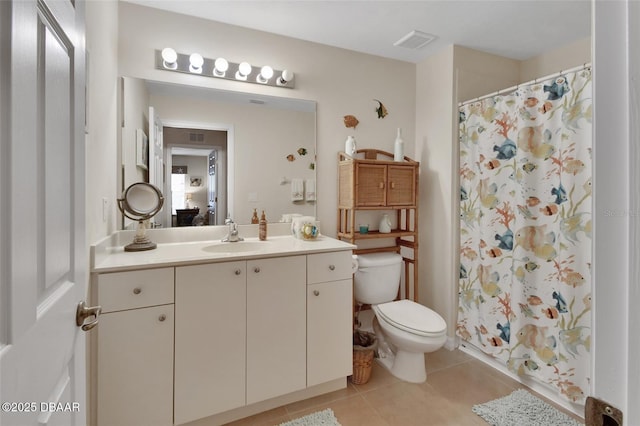 bathroom with toilet, a shower with shower curtain, vanity, visible vents, and tile patterned floors