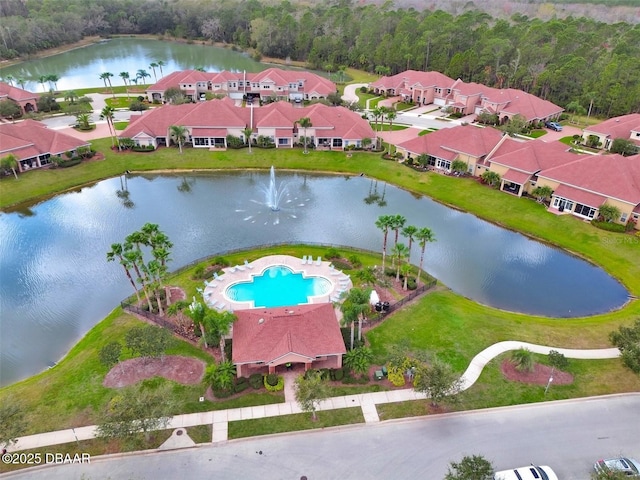 aerial view featuring a water view and a residential view