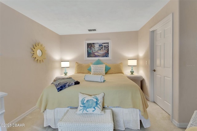 bedroom with baseboards, visible vents, and light colored carpet