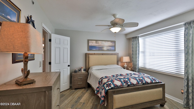 bedroom featuring hardwood / wood-style flooring and ceiling fan