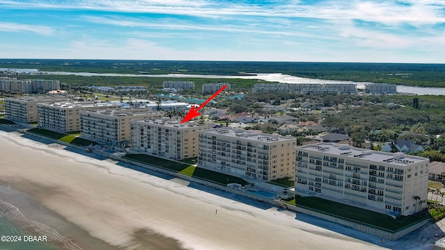 aerial view with a beach view and a water view