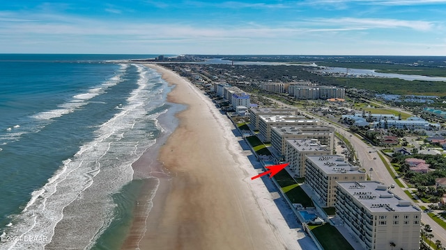 drone / aerial view with a view of the beach and a water view