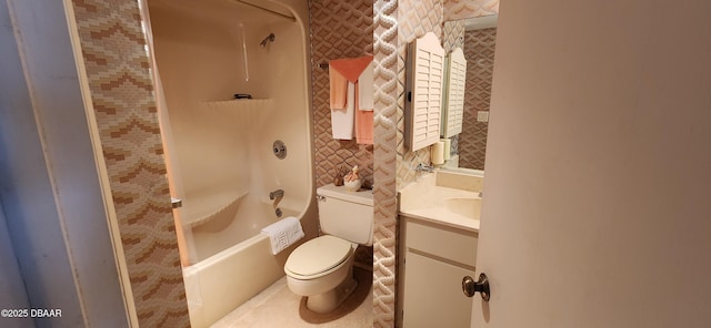 bathroom featuring vanity, toilet, and bathtub / shower combination