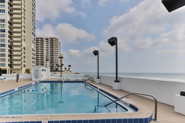 community pool with a water view