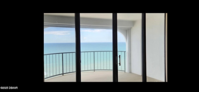 entryway with a water view