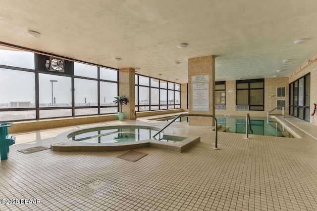 3003 S Atlantic Ave Unit 21A2, Daytona Beach, FL 32118 - indoor pool featuring a hot tub