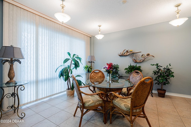 dining area with light tile patterned floors