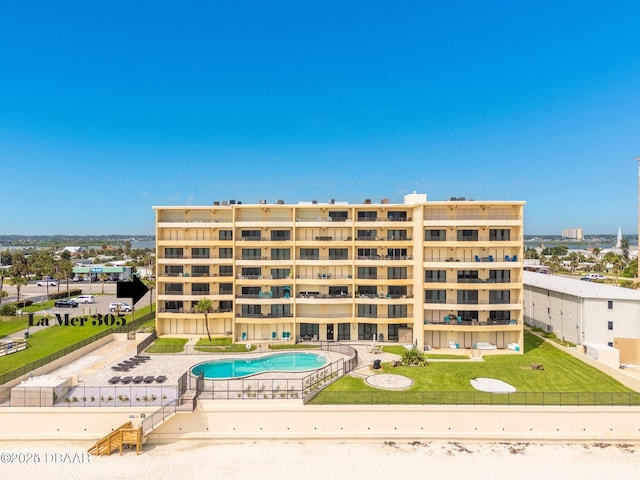 view of property with a community pool