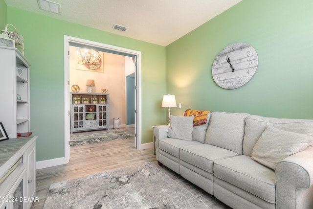 living room with light hardwood / wood-style flooring