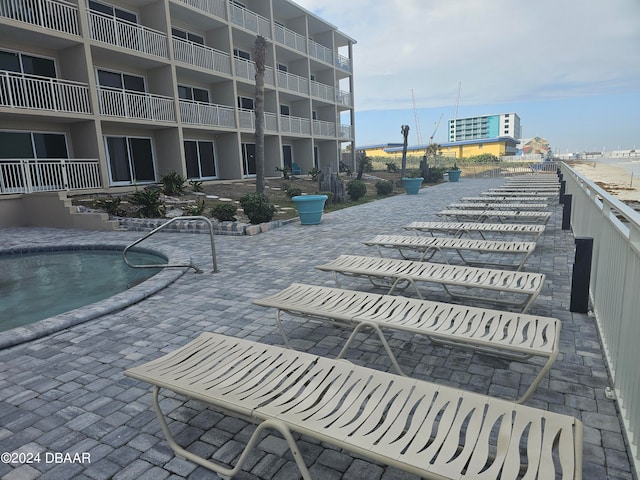 view of property's community with a pool