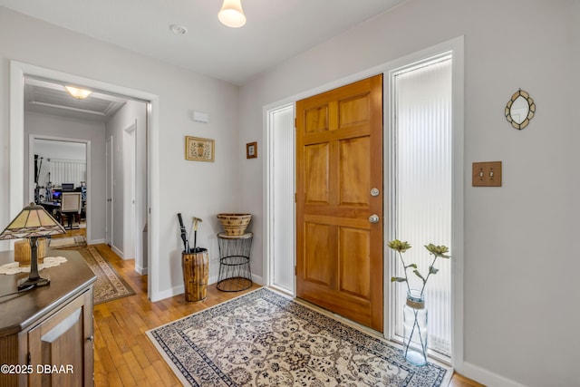 200 W Washington Ave, Deland, FL 32720 - entryway featuring light wood finished floors and baseboards